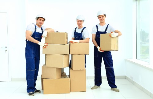 Packed office equipment and furniture ready for relocation