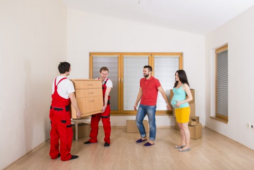 Loading furniture into a truck for a local move in Haringey