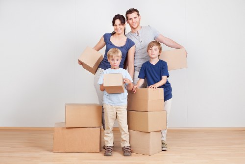 Local packing team organising boxes in a Haringey property