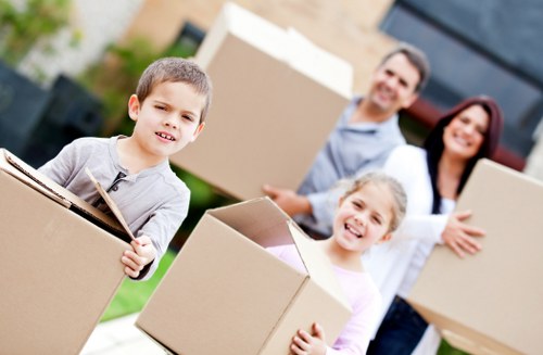 Packed boxes and furniture ready for a local removal service