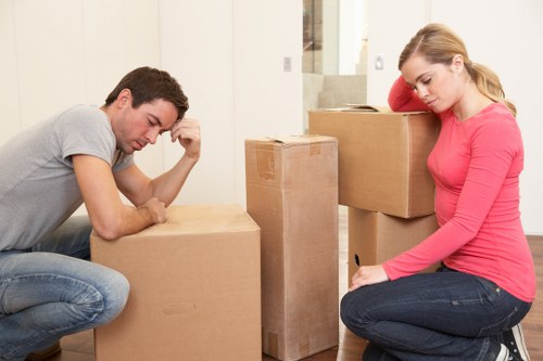Professional movers loading items for transport in Haringey