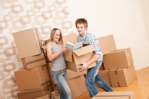 Packed moving boxes and furniture ready for local removals in Haringey