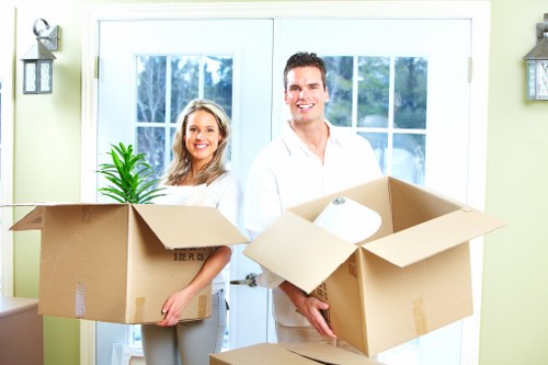 Packed boxes and furniture ready for loading
