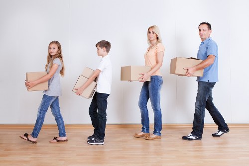Loading furniture and boxes into a van for a local Haringey removal